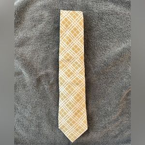 Burberry plaid gold tie. 100% silk. Made in England.
